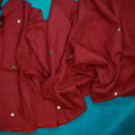 Tanvi in Earthy maroon