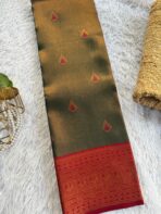 The Radiant Tapestry in Bottle green & Red with Meena motifs