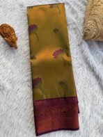 The Radiant Tapestry in Sheen green & Magenta with floral motifs