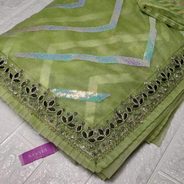 Netted cutwork designer saree in Turquoise