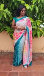 Florals on georgette (Saree) - Teal blue