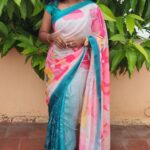Florals on georgette (Saree) - Teal blue