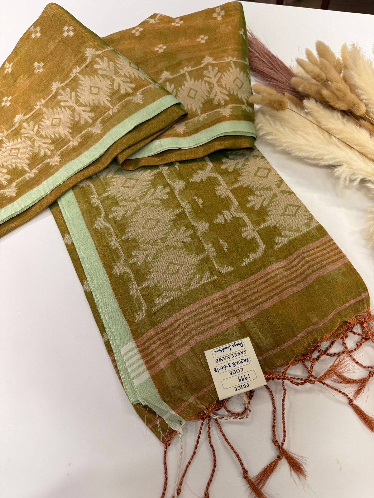 8dd30eba-4962-4be0-ac2c-08a923e3dc51 Raaga (Ikat woven Mul tissue) - Moss green - Image 1